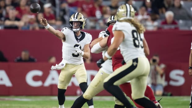 New Orleans Saints quarterback Jake Haener (3) throws against the Arizona Cardinals 