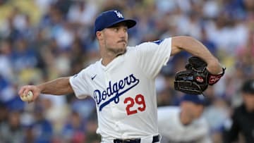 Jun 13, 2024; Los Angeles, California, USA;  Los Angeles Dodgers relief pitcher Michael Grove (29) delivers to the plate in the first inning against the Texas Rangers at Dodger Stadium. Mandatory Credit: Jayne Kamin-Oncea-Imagn Images