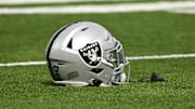 Oct 20, 2024; Inglewood, California, USA; Las Vegas Raiders helmet on the turn at SoFi Stadium during pregame warmups before an NFL game against the Los Angeles Rams. Mandatory Credit: Robert Hanashiro-Imagn Images