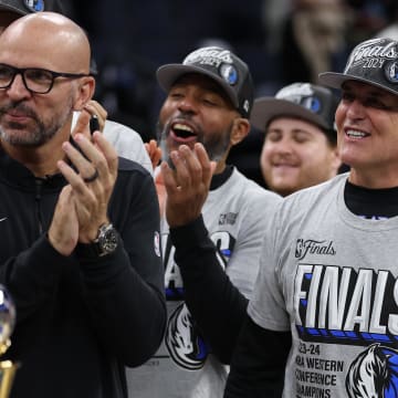 May 30, 2024; Minneapolis, Minnesota, USA; Dallas Mavericks minority owner Mark Cuban (right) celebrates with head coach Jason Kidd after winning the Western Confrerence Championship against the Minnesota Timberwolves in game five of the western conference finals for the 2024 NBA playoffs at Target Center. Mandatory Credit: Jesse Johnson-USA TODAY Sports