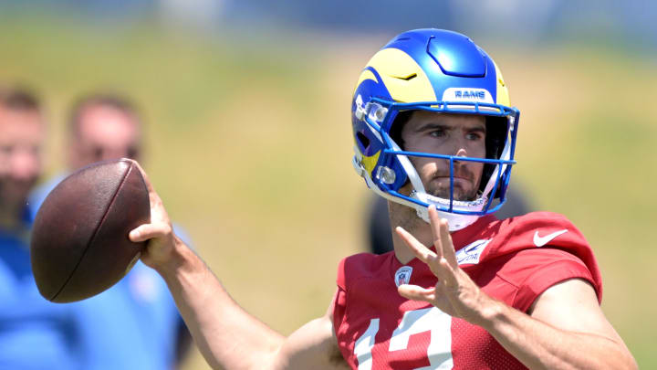 May 28, 2024; Thousand Oaks, CA, USA; Los Angeles Rams quarterback Stetson Bennett (13) throws a pass during OTAs at the team training facility at California Lutheran University. Mandatory Credit: Jayne Kamin-Oncea-USA TODAY Sports