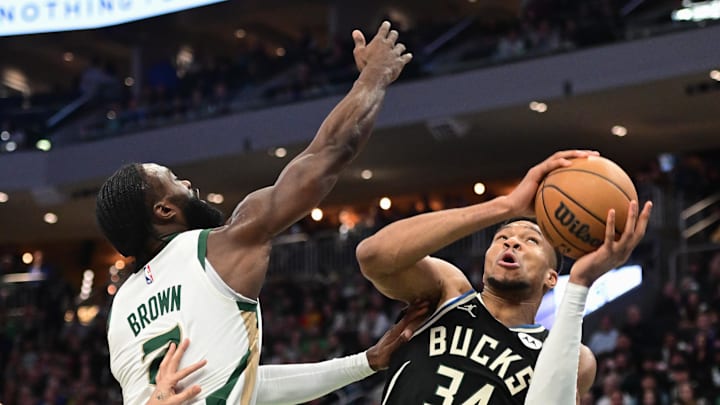 Jaylen Brown defending Giannis Antetokounmpo.