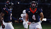 Sep 26, 2025; Charlottesville, Virginia, USA; Virginia Cavaliers quarterback Chandler Morris (4) celebrates after scoring a touchdown against the Florida State Seminoles during the second quarter at Scott Stadium. Mandatory Credit: Geoff Burke-Imagn Images