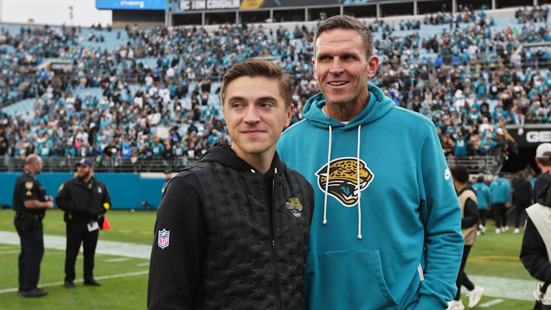Jan 4, 2026; Jacksonville, Florida, USA; Jacksonville Jaguars general manager James Gladstone (left) and executive vice president of football operations Tony Boselli stand on the field after the game against the Tennessee Titans at EverBank Stadium. Mandatory Credit: Travis Register-Imagn Images