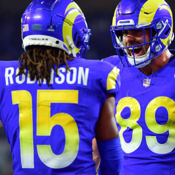 Dec 21, 2023; Inglewood, California, USA; Los Angeles Rams wide receiver Demarcus Robinson (15) celebrates his touchdown scored against the New Orleans Saints with tight end Tyler Higbee (89) during the first half at SoFi Stadium. Mandatory Credit: Gary A. Vasquez-USA TODAY Sports
