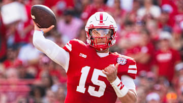 Oct 5, 2024; Lincoln, Nebraska, USA; Nebraska Cornhuskers quarterback Dylan Raiola (15) throws a pass against the Rutgers Scarlet Knights during the second quarter at Memorial Stadium. Mandatory Credit: Dylan Widger-Imagn Images