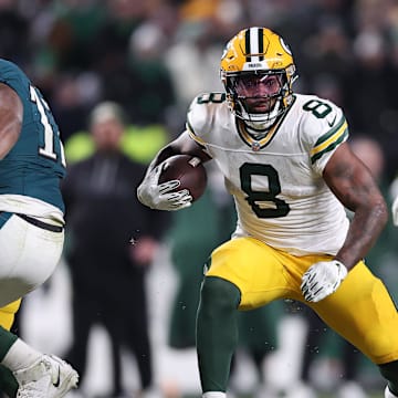 Green Bay Packers running back Josh Jacobs (8) rushes the ball against the Philadelphia Eagles.