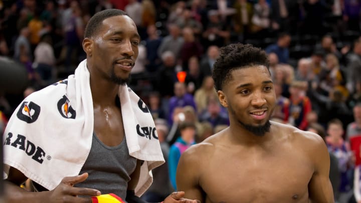 Feb 12, 2020; Salt Lake City, Utah, USA; Miami Heat forward Bam Adebayo (left) and Utah Jazz guard Donovan Mitchell (right) pose for a photo after exchanging jerseys following a game at Vivint Smart Home Arena. Mandatory Credit: Russell Isabella-USA TODAY Sports