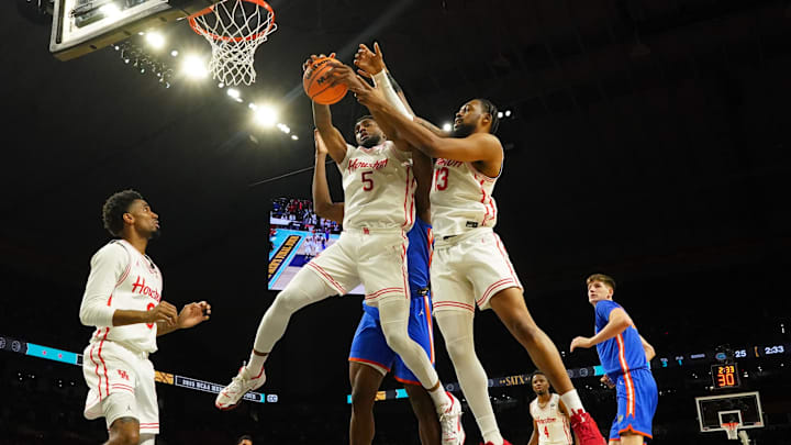Houston Cougars forward Ja'Vier Francis (5) and Houston Cougars forward J'Wan Roberts (13) rebound against the Florida Gators