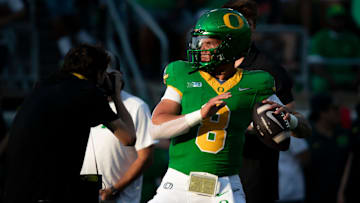 Oregon quarterback Dillon Gabriel throws out a pass during warm ups as the Oregon Ducks host the Boise State Broncos Saturday, Sept. 7, 2024 at Autzen Stadium in Eugene, Ore.