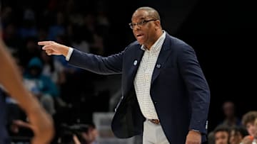 Mar 12, 2025; Charlotte, NC, USA; North Carolina Tar Heels head coach Hubert Davis reacts in the first half at Spectrum Center. Mandatory Credit: Bob Donnan-Imagn Images