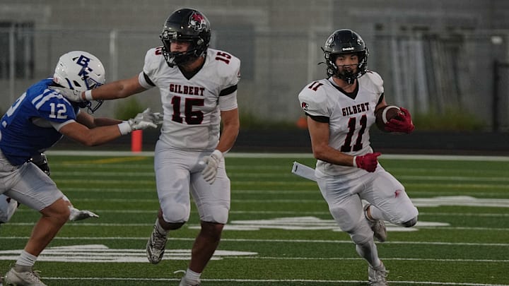 Gilbert's running back Cameron Cantonwine (11) runs with the ball for a touchdown against Bondurant-Farrar during the fourth quarter on Sept. 26, 2025 at Bondurant-Farrar High School football field in Bondurant, Iowa. Gilbert's running back Cameron Cantonwine (11) runs with the ball for a touchdown against Bondurant-Farrar during the fourth quarter on Sept. 26, 2025 at Bondurant-Farrar High School football field in Bondurant, Iowa.