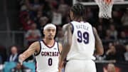 Gonzaga seniors Ryan Nembhard (0) and Khalif Battle (99).