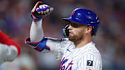 Aug 27, 2025; New York City, New York, USA; New York Mets left fielder Brandon Nimmo (9) reacts after a single during the ninth inning against the Philadelphia Phillies at Citi Field. Mandatory Credit: Vincent Carchietta-Imagn Images