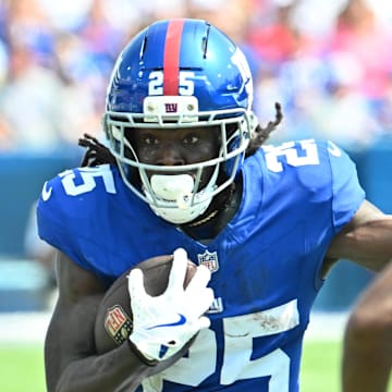 Aug 9, 2025; Orchard Park, New York, USA; New York Giants running back Dante Miller (25) carries the ball against the Buffalo Bills in the third quarter at Highmark Stadium.  