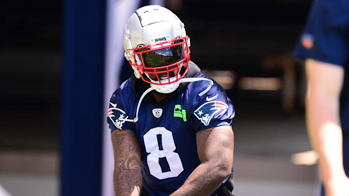 Bentley walks to the practice fields for minicamp at Gillette Stadium.