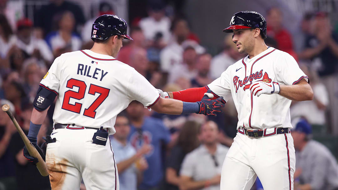 Atlanta Braves first baseman Matt Olson (28) celebrates after a home run with third baseman Austin Riley (27)