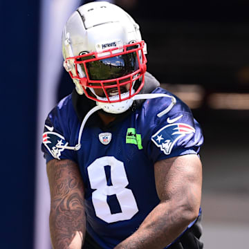 Jun 10, 2024; Foxborough, MA, USA; New England Patriots linebacker Ja'Whaun Bentley (8) walks to the practice fields for minicamp at Gillette Stadium.