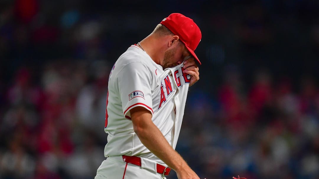 Jul 30, 2025; Anaheim, California, USA; Los Angeles Angels pitcher Reid Detmers (48) walks to the dugout after being relieved against the Texas Rangers during the eighth inning at Angel Stadium. Mandatory Credit: Gary A. Vasquez-Imagn Images Jul 30, 2025; Anaheim, California, USA; Los Angeles Angels pitcher Reid Detmers (48) walks to the dugout after being relieved against the Texas Rangers during the eighth inning at Angel Stadium. Mandatory Credit: Gary A. Vasquez-Imagn Images