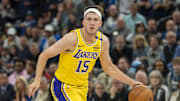 Apr 25, 2025; Minneapolis, Minnesota, USA; Los Angeles Lakers guard Austin Reaves (15) dribbles the ball against the Minnesota Timberwolves during game three of first round for the 2024 NBA Playoffs at Target Center. Mandatory Credit: Jesse Johnson-Imagn Images