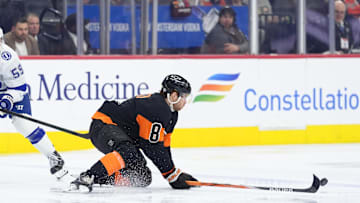 Mar 13, 2025; Philadelphia, Pennsylvania, USA; Philadelphia Flyers defenseman Cam York (8) defends a pass against the Tampa Bay Lightning in the first period at Wells Fargo Center.