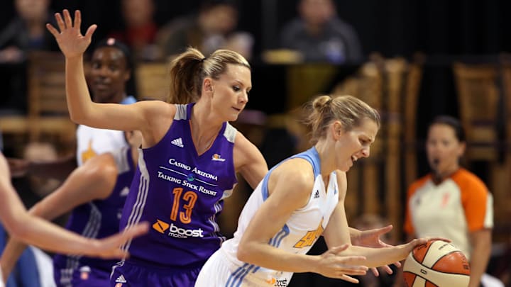 Sep 12, 2014; Chicago, IL, USA; Chicago Sky guard Allie Quigley (right) loses the ball while defended by Phoenix Mercury forward Penny Taylor (13) during the first quarter in game three of the 2014 WNBA Finals at UIC Pavilion. Mandatory Credit: Jerry Lai-Imagn Images Sep 12, 2014; Chicago, IL, USA; Chicago Sky guard Allie Quigley (right) loses the ball while defended by Phoenix Mercury forward Penny Taylor (13) during the first quarter in game three of the 2014 WNBA Finals at UIC Pavilion. Mandatory Credit: Jerry Lai-Imagn Images