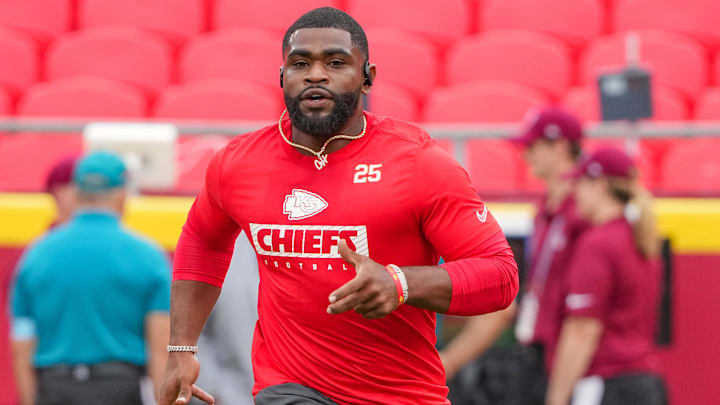Aug 22, 2024; Kansas City, Missouri, USA; Kansas City Chiefs running back Clyde Edwards-Helaire (25) warms up against the Chicago Bears prior to a game at GEHA Field at Arrowhead Stadium. Mandatory Credit: Denny Medley-Imagn Images