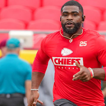 Aug 22, 2024; Kansas City, Missouri, USA; Kansas City Chiefs running back Clyde Edwards-Helaire (25) warms up against the Chicago Bears prior to a game at GEHA Field at Arrowhead Stadium. Mandatory Credit: Denny Medley-USA TODAY Sports