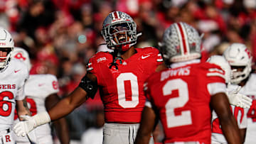 Ohio State Buckeyes linebacker Sonny Styles celebrates a sack by Caleb Downs against Rutgers. 