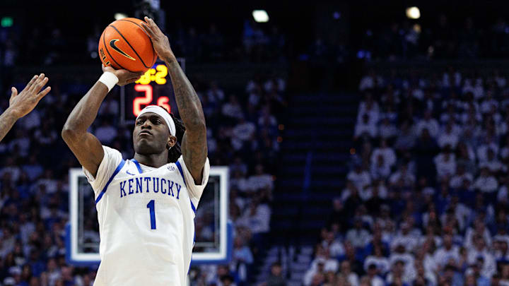 Feb 28, 2026; Lexington, Kentucky, USA; Kentucky Wildcats guard Denzel Aberdeen (1) shoots the ball against Vanderbilt Commodores guard Duke Miles (2) during the second half at Rupp Arena at Central Bank Center. Mandatory Credit: Jordan Prather-Imagn Images