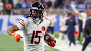 Sep 14, 2025; Detroit, Michigan, USA; Chicago Bears wide receiver Rome Odunze (15) carries the ball for a touchdown against the Detroit Lions during the first quarter at Ford Field.