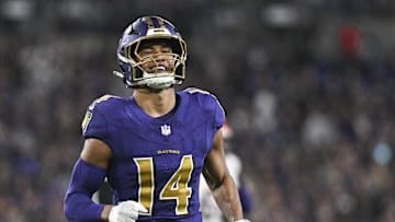 Nov 7, 2024; Baltimore, Maryland, USA; Baltimore Ravens safety Kyle Hamilton (14) reacts after tips a Cincinnati Bengals quarterback Joe Burrow (9) pass during the first quarter  at M&T Bank Stadium. Mandatory Credit: Tommy Gilligan-Imagn Images