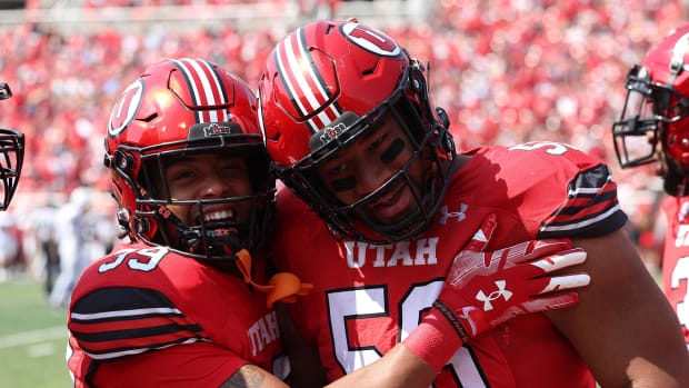 Utah Utes defensive tackle Junior Tafuna (58) celebrates an interception. redit: Rob Gray-USA TODAY Sports