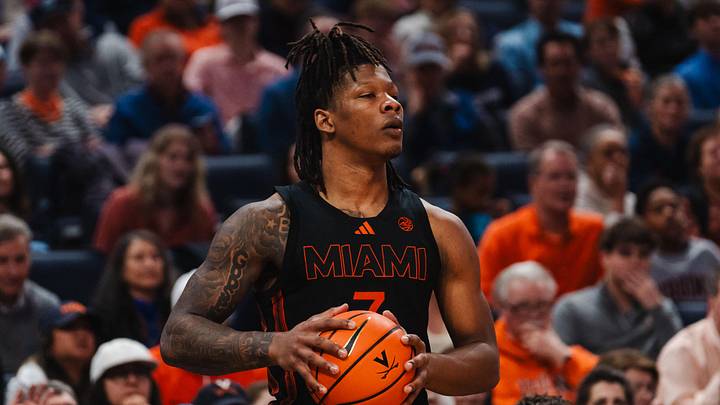 Feb 21, 2026; Charlottesville, Virginia, USA; Miami (FL) Hurricanes forward Shelton Henderson (7) controls the ball during the first half against the Virginia Cavaliers at John Paul Jones Arena. Mandatory Credit: Emily Faith Morgan-Imagn Images
