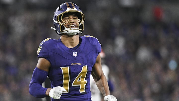 Baltimore Ravens safety Kyle Hamilton reacts after tipping a pass from Cincinnati Bengals quarterback Joe Burrow.