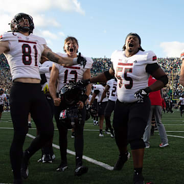 Northern Illinois celebrates after winning a NCAA college football game 16-14 against Notre Dame at Notre Dame Stadium on Saturday, Sept. 7, 2024, in South Bend.