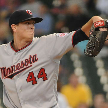 Former Minnesota Twins starting pitcher Kyle Gibson throws a pitch during a game in 2019.