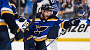 May 2, 2025; St. Louis, Missouri, USA; St. Louis Blues left wing Nathan Walker (26) reacts after scoring a goal against the Winnipeg Jets during the second period in game six of the first round of the 2025 Stanley Cup Playoffs at Enterprise Center. Mandatory Credit: Connor Hamilton-Imagn Images