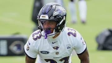 Jul 24, 2025; Owings Mills, MD, USA; Baltimore Ravens cornerback Jaire Alexander (23) runs drills during training camp at the Under Armour Performance Center. Mandatory Credit: Mitch Stringer-Imagn Images