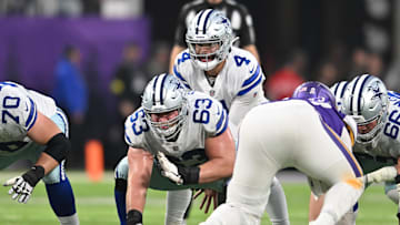 Nov 20, 2022; Minneapolis, Minnesota, USA; Dallas Cowboys quarterback Dak Prescott (4) and center Tyler Biadasz (63) in action during the game against the Minnesota Vikings at U.S. Bank Stadium. Mandatory Credit: Jeffrey Becker-Imagn Images