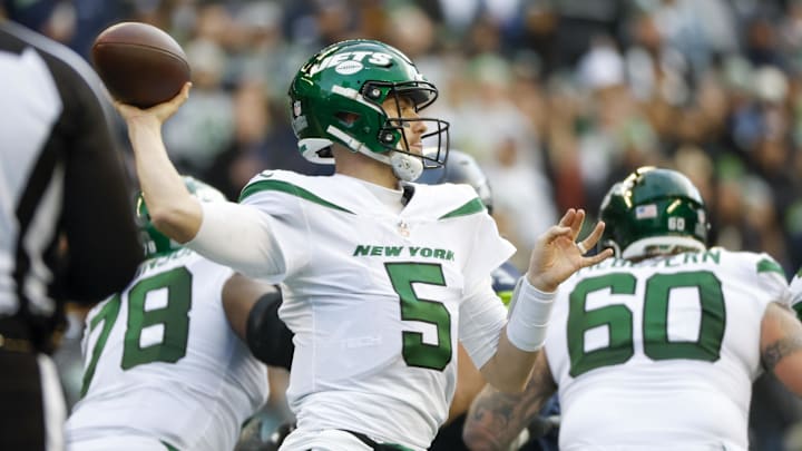 Jan 1, 2023; Seattle, Washington, USA; New York Jets quarterback Mike White (5) passes against the Seattle Seahawks during the third quarter at Lumen Field