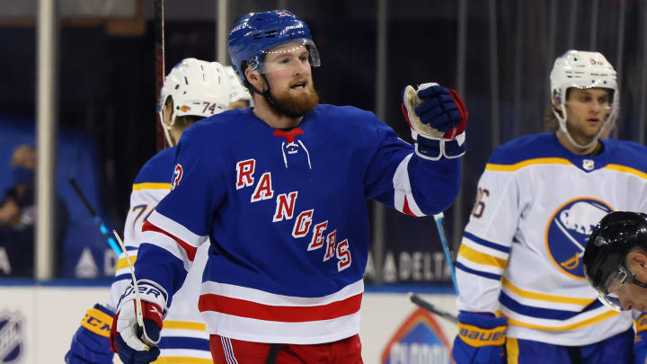 Apr 27, 2021; New York, NY, USA;  Alexis Lafreniere #13 of the New York Rangers celebrates his goal in the third period against the Buffalo Sabres at Madison Square Garden on April 27, 2021 in New York City.  Mandatory Credit: Bruce Bennett/Pool Photo-USA TODAY Sports