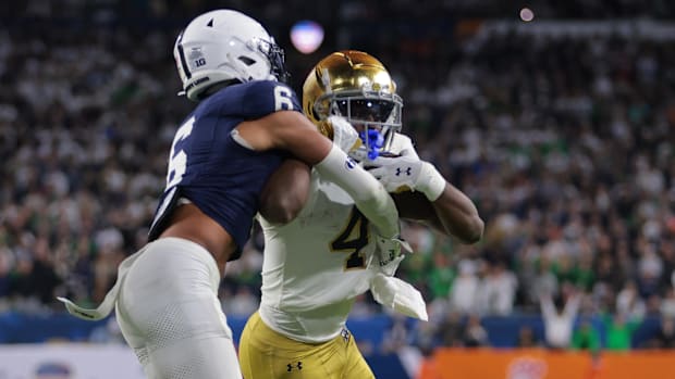 Jeremiyah Love powers his way into the end zone for Notre Dame against Penn State in 2025 Orange Bow