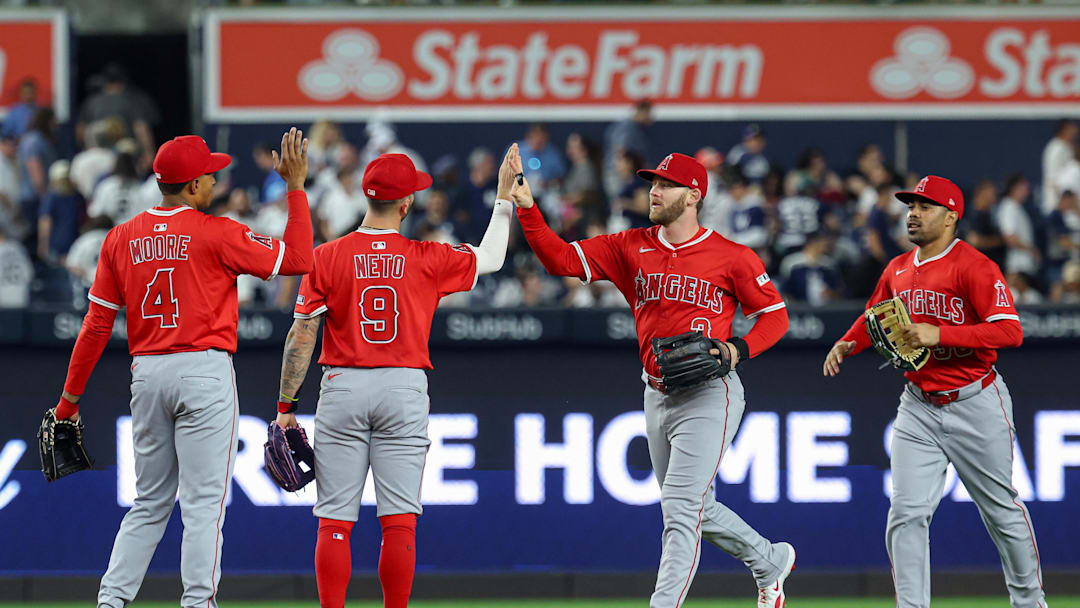 Jun 18, 2025; Bronx, New York, USA; Los Angeles Angels  left fielder Taylor Ward (3) celebrates with shortstop Zach Neto (9) and teammates after defeating the New York Yankees at Yankee Stadium. Mandatory Credit: Vincent Carchietta-Imagn Images