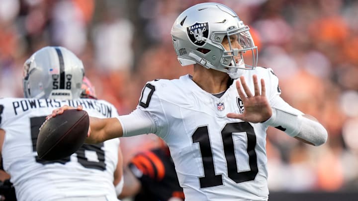 Las Vegas Raiders quarterback Desmond Ridder (10) throws a pass in the third quarter of the NFL Week 9 game between the Cincinnati Bengals and the Las Vegas Raiders at Paycor Stadium in downtown Cincinnati on Sunday, Nov. 3, 2024. The Bengals collected their first win at home with a 41-24 victory over the Raiders. Las Vegas Raiders quarterback Desmond Ridder (10) throws a pass in the third quarter of the NFL Week 9 game between the Cincinnati Bengals and the Las Vegas Raiders at Paycor Stadium in downtown Cincinnati on Sunday, Nov. 3, 2024. The Bengals collected their first win at home with a 41-24 victory over the Raiders.