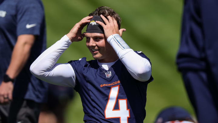 May 23, 2024; Englewood, CO; Denver Broncos quarterback Zach Wilson (4) during organized team activities at Centura Health Training Center. Mandatory Credit: Isaiah J. Downing-USA TODAY Sports