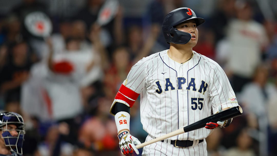 Mar 21, 2023; Miami, Florida, USA; Japan third baseman Munetaka Murakami (55) looks on after hitting a home run during the second inning against USA at LoanDepot Park. Mandatory Credit: Sam Navarro-Imagn Images