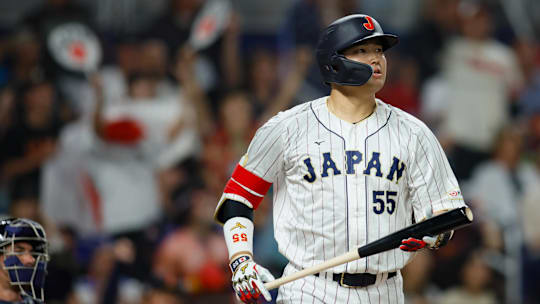 Mar 21, 2023; Miami, Florida, USA; Japan third baseman Munetaka Murakami (55) looks on after hitting a home run during the second inning against USA at LoanDepot Park. Mandatory Credit: Sam Navarro-Imagn Images
