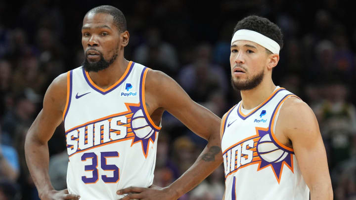 Mar 20, 2024; Phoenix, Arizona, USA; Phoenix Suns forward Kevin Durant (35) and Phoenix Suns guard