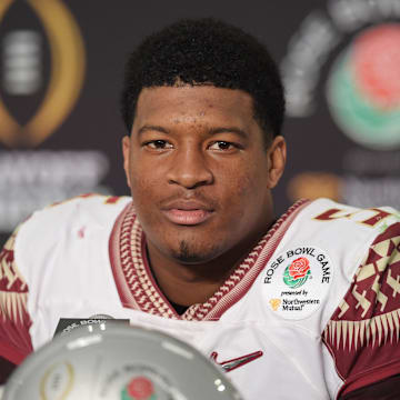 Jan 1, 2015; Pasadena, CA, USA; Florida State Seminoles quarterback Jameis Winston (5) during the post-game press conference after the 2015 Rose Bowl college football game at Rose Bowl. Oregon Ducks defeated Florida State Seminoles 59-20. Mandatory Credit: Kirby Lee-Imagn Images